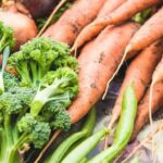 Organic compost, a good mulch for vegetable gardens, enhances soil fertility and moisture retention