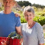 The Vegetable Gardener's Bible 2nd Edition eBook cover with a lush garden and tools