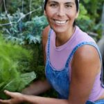 Vibrant marigolds bring color and natural pest control to vegetable gardens