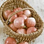 Safely control weeds in vegetable gardens with organic solutions like vinegar or corn gluten